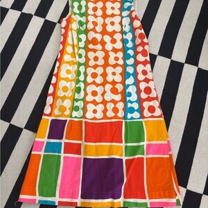 Miss Elaine White and Orange Garment